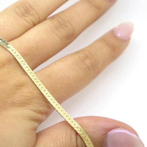 Collier Chaîne plate en or jaune 58 Facettes