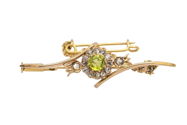 Broche Broche ancienne en or jaune avec olivine et diamants. 58 Facettes 10280