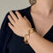Bracelet Elegant Bracelet en or jaune à maille géométrique 58 Facettes MEL0036