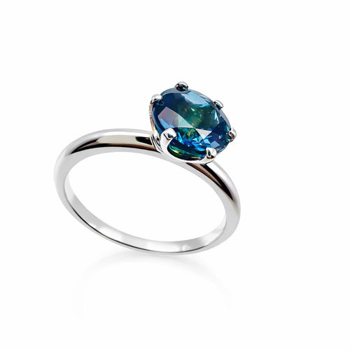 Solitaire en or blanc et topaze centrale, style London blue