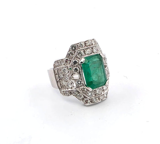 Bague 55 Bague en or blanc avec émeraude et diamants 58 Facettes