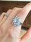 Bague 53 BUCHERER - Bague florale en or blanc et diamants 58 Facettes