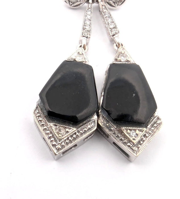 Boucles d'oreilles en or blanc avec diamants et onyx