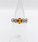 Bague jarretière antique en or rose 18k et platine, citrine et diamants