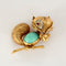 Broche Van Cleef & Arpels  Rare Broche animalière à décor d'Ecureuil en platine et or jaune, diamants, rubis et cabochon de turquoise. 58 Facettes HOU5762
