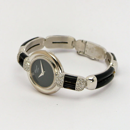 Montre Montre Chopard Genève en or blanc 18 carats avec onyx et diamants 58 Facettes
