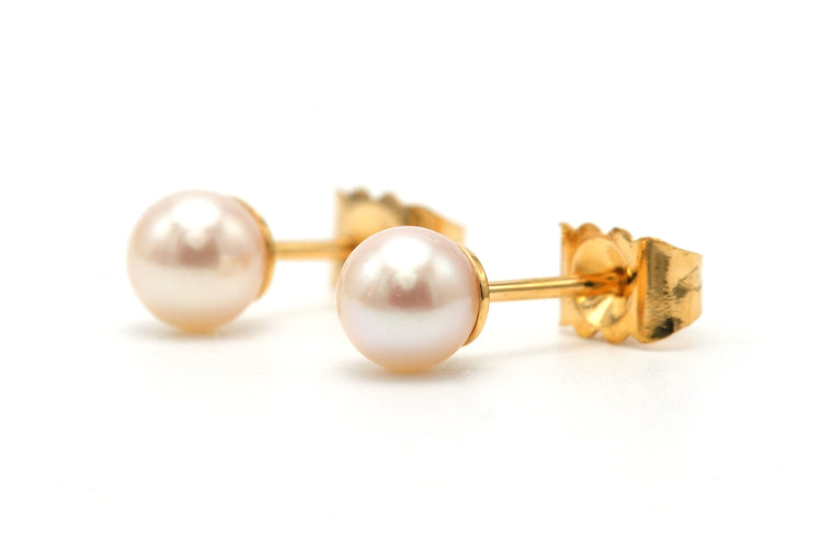 Boucles d'oreilles contemporaines serties de perles en or jaune 18 carats