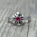 Bague 49 Bague marguerite rubis diamants 58 Facettes 229