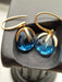 Boucles d'oreilles POMELLATO - Boucles d'oreilles collection Veleno en or jaune et topaze bleue 58 Facettes