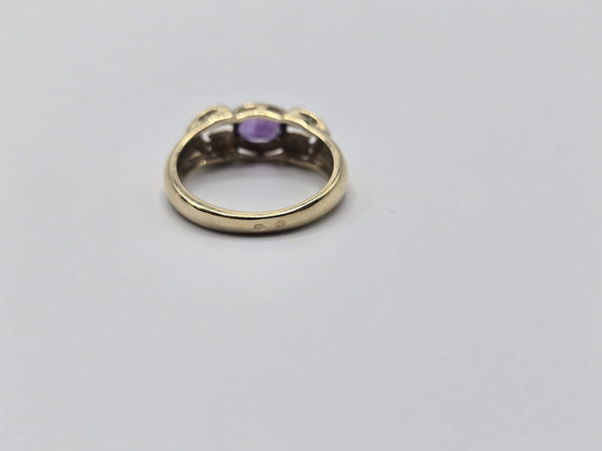 Bague 54 Bague OR Jaune 14k sertie d'une tourmaline au centre et d'éclats de diamants sur les côtés 58 Facettes 1-0000437/5