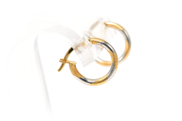 Boucles d'oreilles Boucles d'oreilles "créoles" contemporaines en or jaune et blanc 18 carats 58 Facettes B696