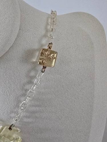 Collier Chanel - Collier Ice Cube vintage en métal doré et résine 58 Facettes