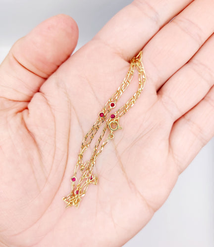 Collier Chaine vintage or jaune mailles gourmette et rubis 58 Facettes B01012