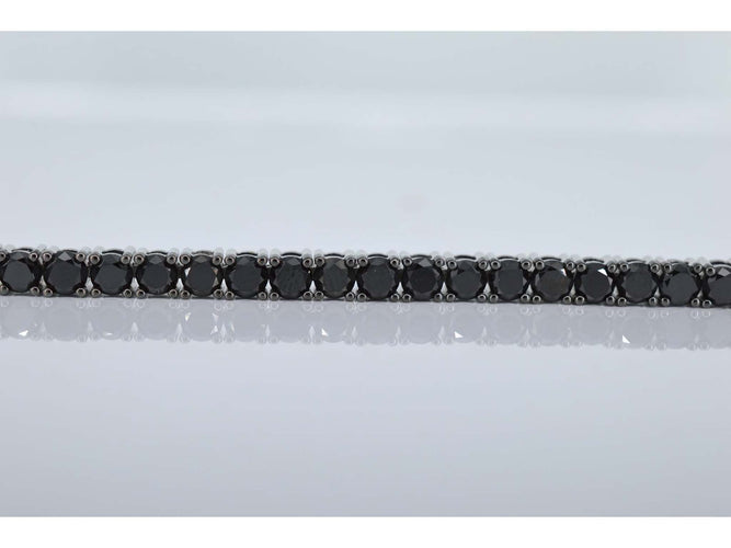 Bracelet Bracelet tennis en or blanc serti de diamants noirs tout autour 58 Facettes 2117
