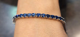 Bracelet Calibrated sapphires river bracelet in white gold 58 Facettes