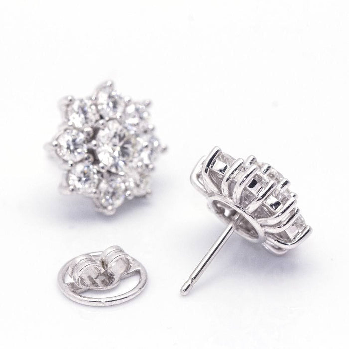 Boucles d'oreilles Boucles d'oreilles ROSETON en or blanc et diamants 58 Facettes D364209LF