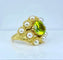 Bague 52 Bague coktail en or jaune 18 carats, péridot 3,98 ct et 9 perles 58 Facettes AB571