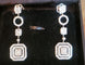 Boucles d'oreilles Boucles d'oreilles contemporaines or blanc, serties de Diamants 58 Facettes