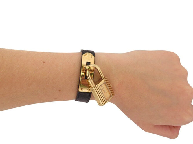 Montre montre vintage HERMES Kelly Mini Cadenas 20 mm plaque or quartz dame 58 Facettes 268902