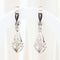 Boucles d'oreilles Boucles d'oreilles vintage ajourées en or blanc 18 carats serties de diamants 58 Facettes 135023B