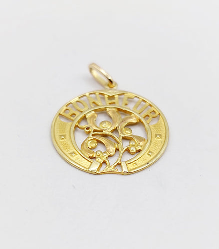 Pendentif Pendentif Art Nouveau or jaune BONHEUR fer à cheval et branche de gui (circa 1920) 58 Facettes A06259