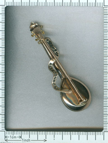 Broche Broche mandoline ornée de diamants, de rubis et de perles, de style victorien français 58 Facettes 14185-0013