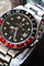 Montre Rolex GMT-Master II 16710 “Coke” rouge et noire, full set 58 Facettes