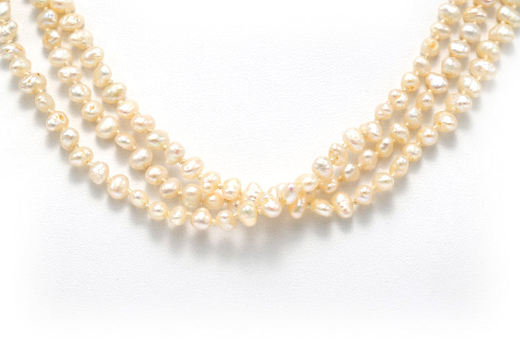 Collier années 70 or blanc, perles et rubis