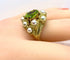 Bague 52 Bague coktail en or jaune 18 carats, péridot 3,98 ct et 9 perles 58 Facettes AB571