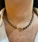 Collier Collier Dinh Van en or jaune 18 carats et boule de bois 58 Facettes