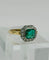 Bague 50 Bague de style Art Déco en or jaune et platine, avec une émeraude centrale et des diamants 58 Facettes 50243