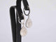 Boucles d'oreilles Boucles d'oreilles en or blanc en forme de larme avec diamants 58 Facettes 2055