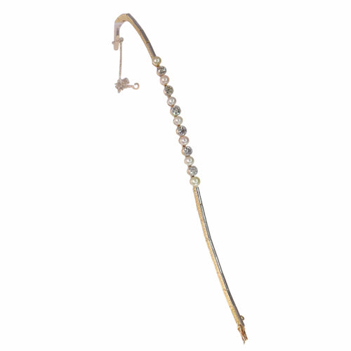 Bracelet L'élégance des années 1920 : bracelet Art déco en diamants et perles 58 Facettes 24137-0350