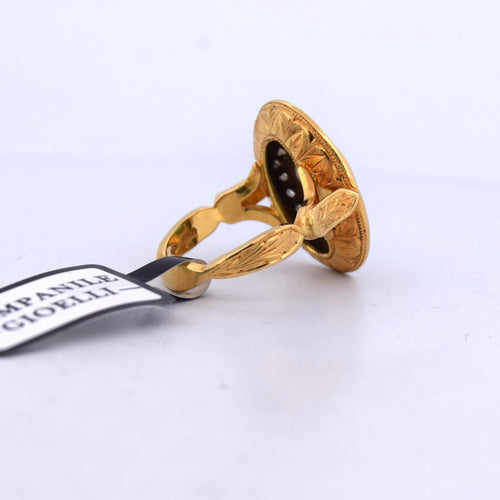 Bague 50 Bague ancienne en or jaune et blanc 18 carats avec émeraudes et diamants 58 Facettes