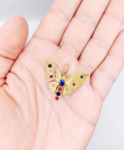 Pendentif Pendentif or rose papillon, pierres de couleur et perles 58 Facettes A05324