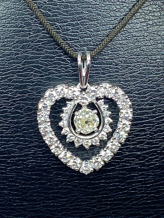 Pendentif Pendentif coeur or blanc diamants 58 Facettes AB438