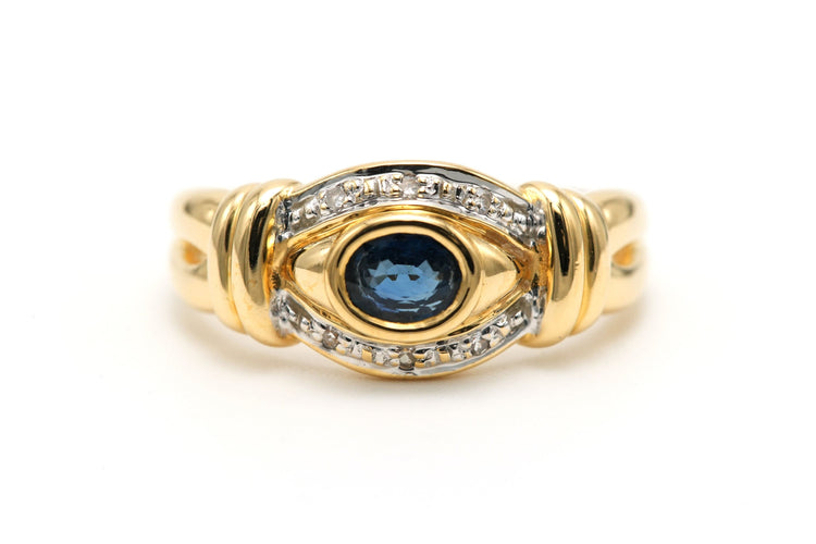 Bague 53 Bague contemporaine en or jaune et blanc 18k sertie d'un saphir et de diamants 58 Facettes 23174