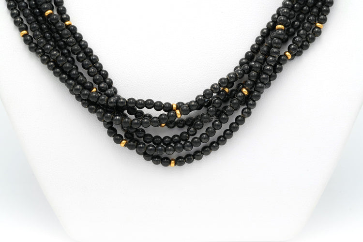 Collier Collier en perles d'hématite, diamants et or jaune 58 Facettes 13822