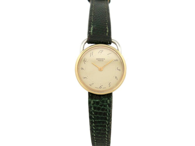 Montre vintage montre HERMES arceau plaque or 25 mm bracelet lezard quartz lady 58 Facettes 267938