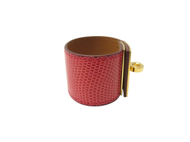 Bracelet bracelet HERMES kelly chien lézard niloticus t3 15 a 17 métal doré rouge 58 Facettes 267512