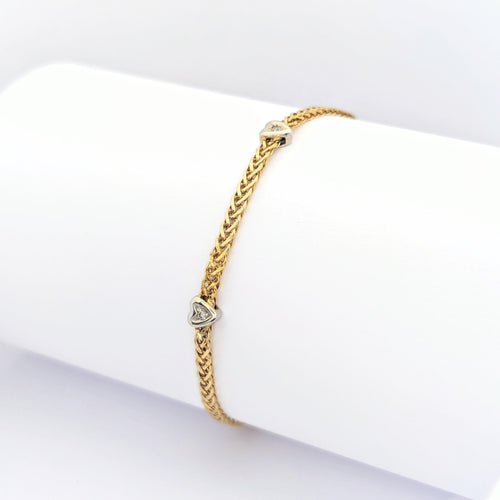 Bracelet Bracelet cœurs en or jaune et diamants 58 Facettes 29810