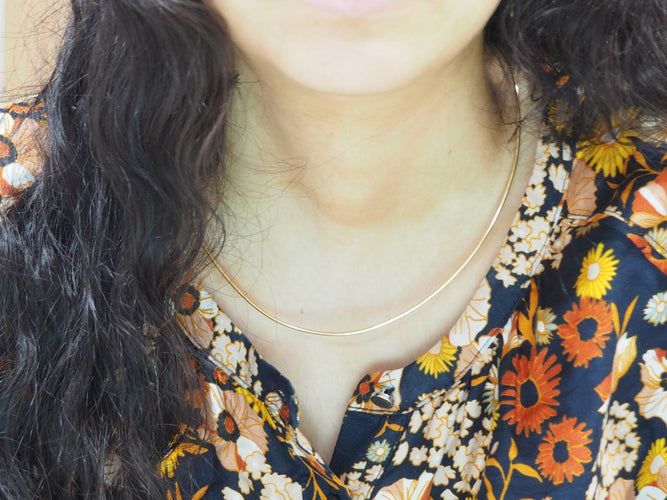 Collier Collier Oméga en or jaune 58 Facettes MTOR