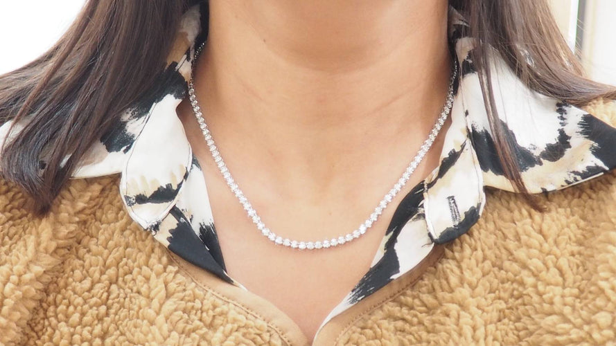 Collier 44.5 Collier rivière en or blanc et diamants 58 Facettes 32532