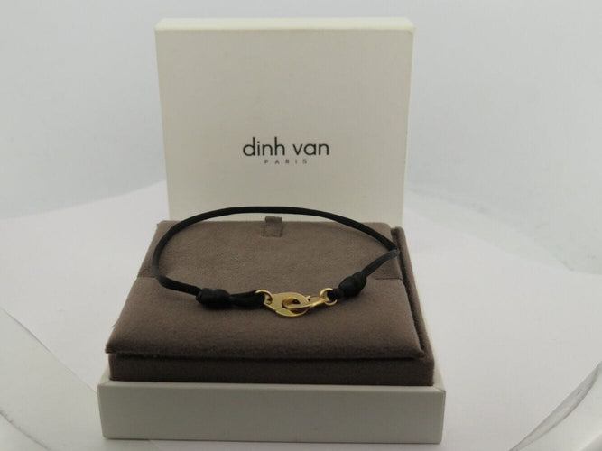 Bracelet bracelet DINH VAN menottes r10 341102 en or jaune 18k 2.9gr & cordon noir 58 Facettes 270151