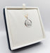 Pendentif AUGIS - Pendentif médaille d'amour or blanc  "+ qu'hier - que demain" L'Originale 58 Facettes G3822X0000