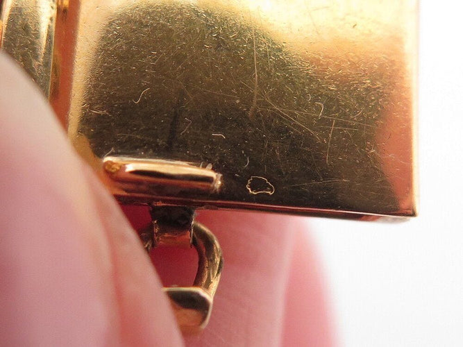 Montre vintage montre baume & mercier tank 37077 mecanique or 18k & oeil de tigre 58 Facettes 268283