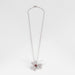 Pendentif Pendentif or blanc, rubis, diamants 58 Facettes