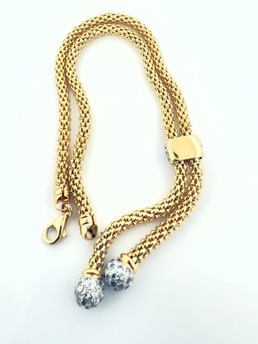 Collier Collier maille popocorn à pompom en or 18 carats 58 Facettes