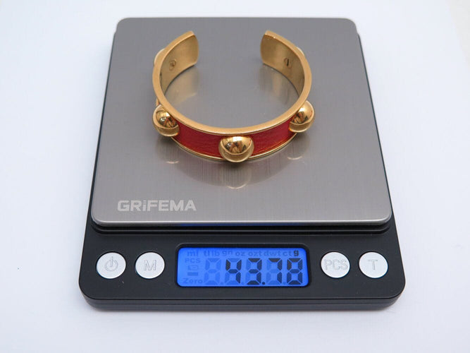Bracelet bracelet HERMES jonc en cuir rouge et metal dore red  en 58 Facettes 272251
