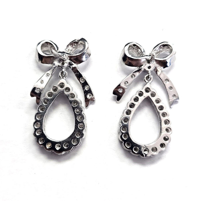 Boucles d'oreilles en platine avec diamants